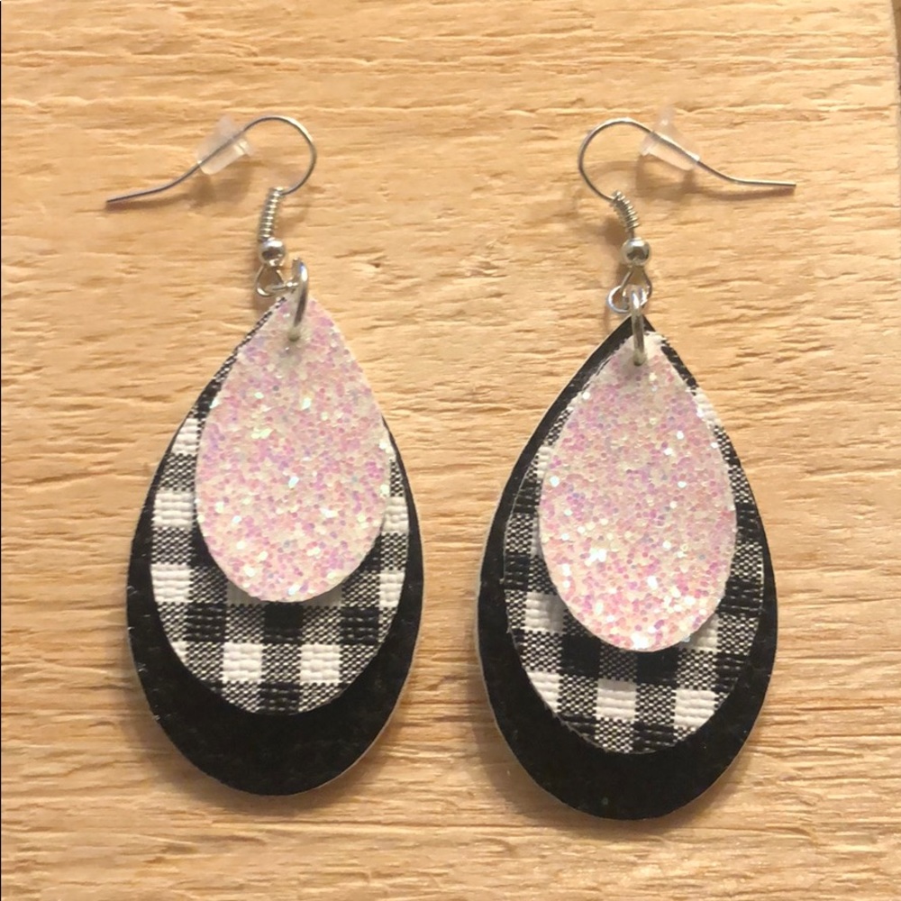 Handmade leather layered earrings.